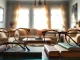 Showcase of vintage frames elegantly displayed in a cozy interior setting highlighting unique designs.