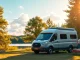 Experience adventure with JRP Campers parked in a scenic campsite.