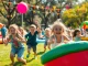 Children enjoying a wildfire event in Perth with activities and celebration, showcasing the fun and excitement.
