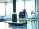 Showcasing a marijuana impairment test device in a lab environment, emphasizing advanced testing technology.