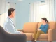 Therapist assisting a client dealing with depression in a serene, welcoming office environment.