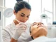 Applying face threads to enhance facial contours in a professional medspa.