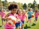 Girls participating in Multi Sports Camps for Girls, showcasing teamwork and fun.