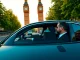 Delivering premium london chauffeur service with a professional driver in an elegant black car.