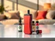 Showcasing the HQD Cuvie disposable vape in a modern setting with colorful designs.
